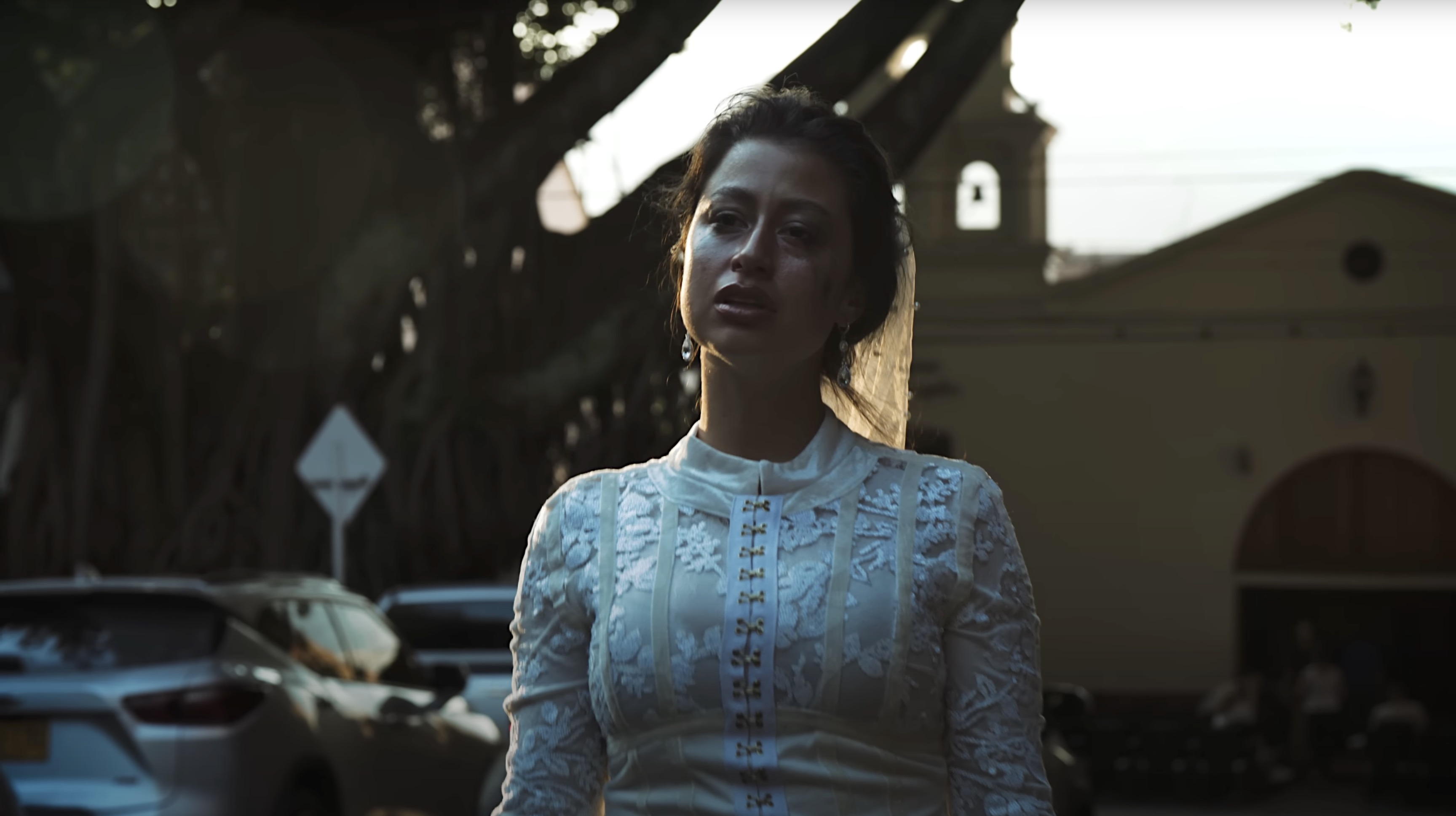 Cinematic outdoor portrait, woman in white lace, Medellín